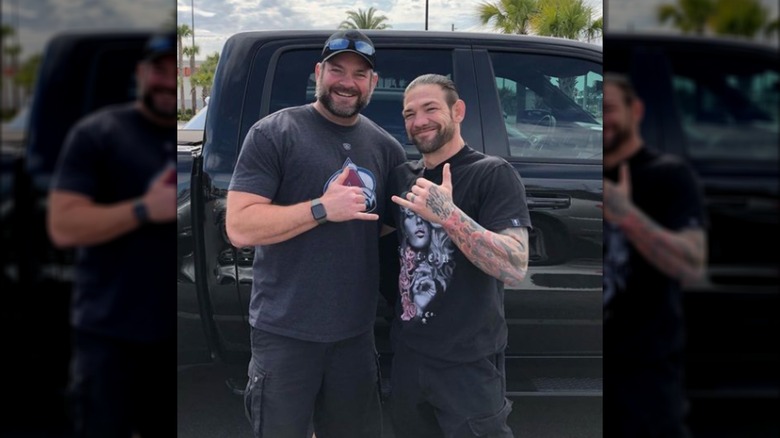 Duane Lee Chapman and Leland Chapman posing for a photograph in Florida, 2022