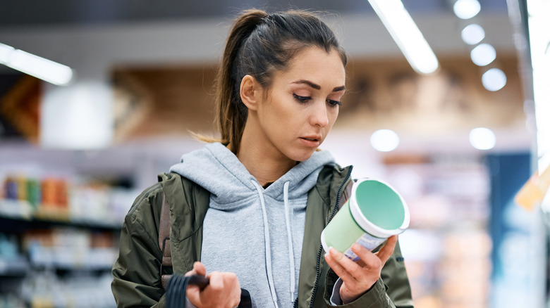 young woman grocery shopping