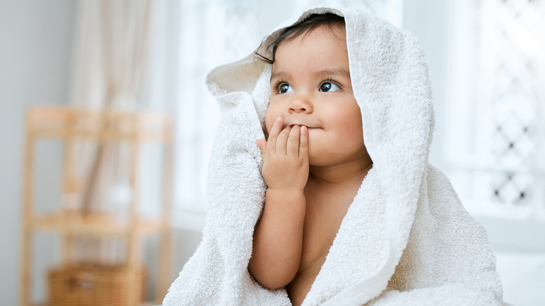 toddler in towel
