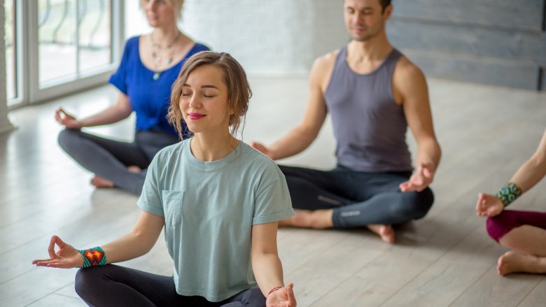 People sitting in lotus position