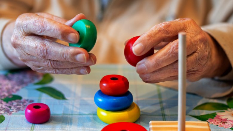 A person's hands doing a memory test