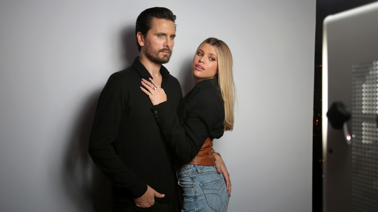 Sofia Richie Scott Disick posing