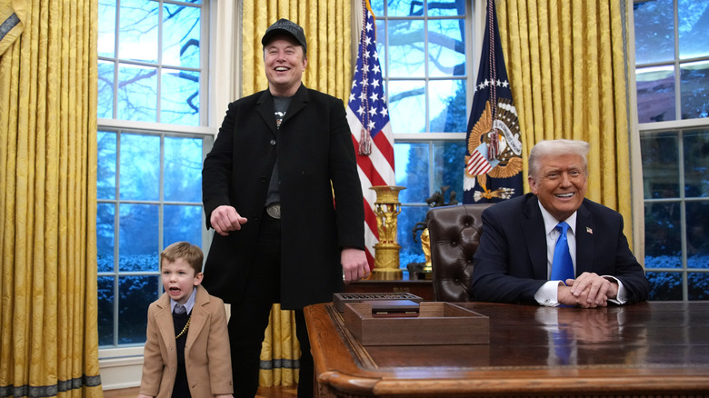 Elon Musk and his son with Donald Trump in the Oval Office