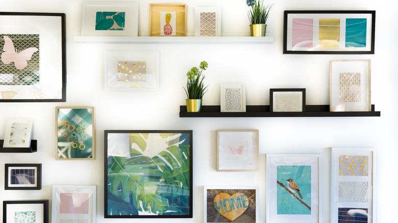 wall decor including frames shelves and plants
