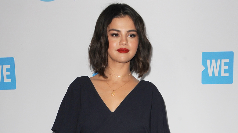 Selena Gomez posing at WE Day in California in 2018