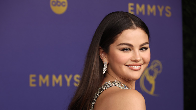 Selena Gomez looking back and smiling