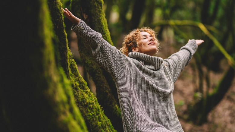 happy woman in the woods