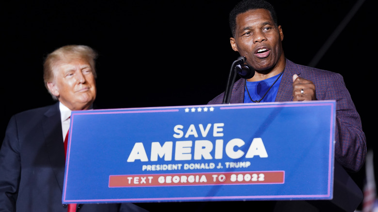 Donald Trump and Herschel Walker at rally 2021