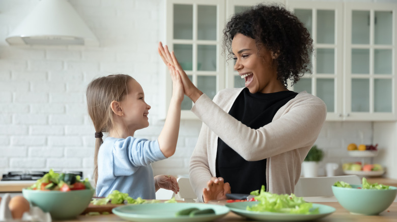 A woman spending time with a child. 