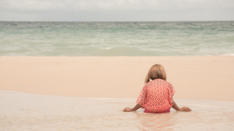 child alone on beach