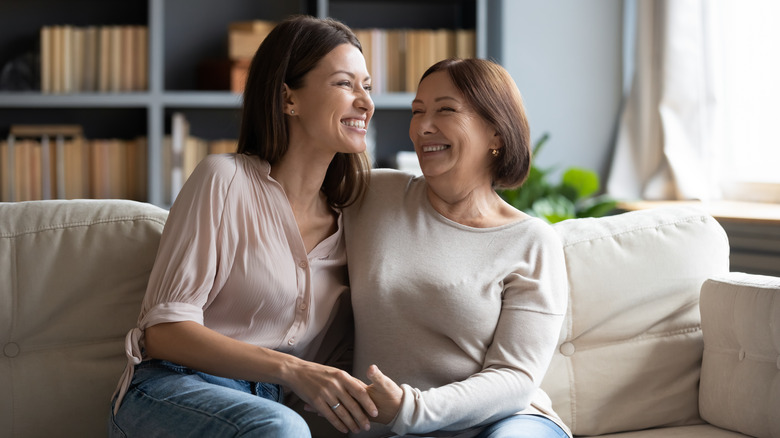 Mother and daughter laughing