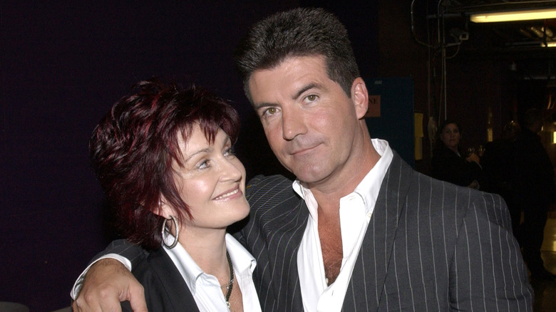 Simon Cowell and Sharon Osbourne smiling