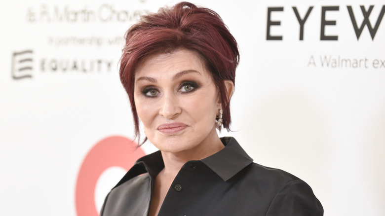 Sharon Osbourne posing for photos