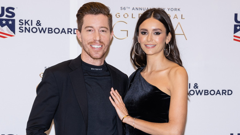 Shaun White posing with Nina Dobrev