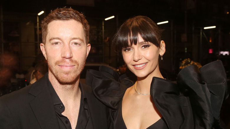 Shaun White and Nina Dobrev smiling