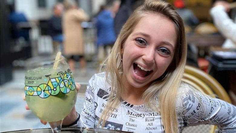 Shauna Rae smiling at restaurant