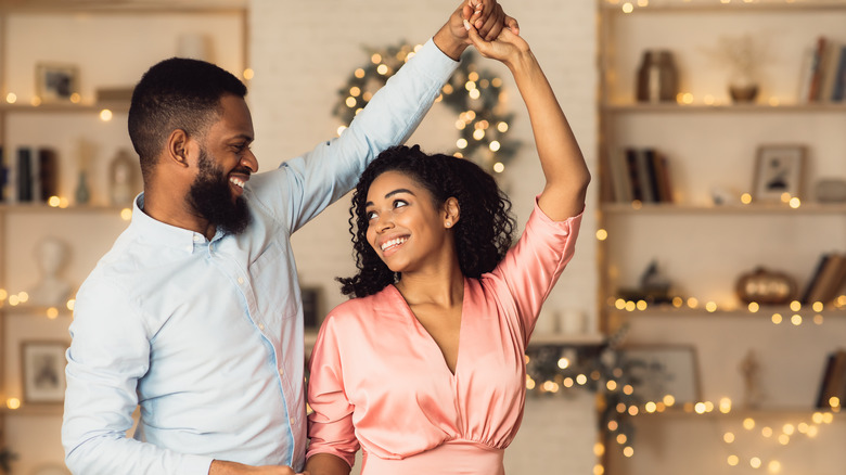 Bearded man and woman dancing