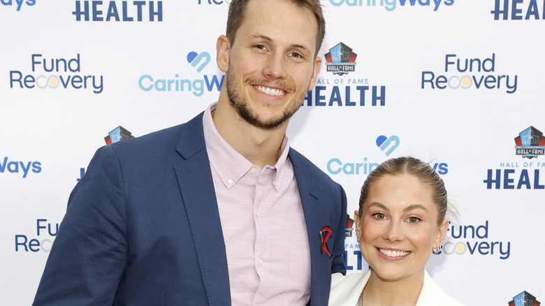 Andrew East and Shawn Johnson East posing for press