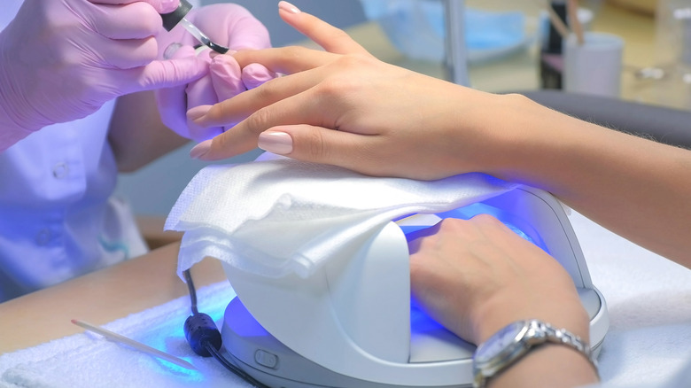 manicure with UV light machine