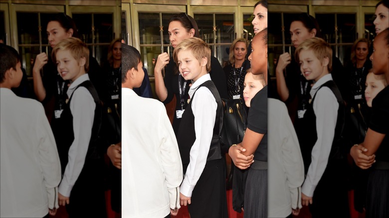 Shiloh Jolie-Pitt wearing a suit 