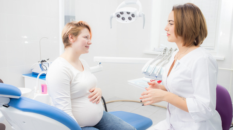 pregnant woman in dentist office