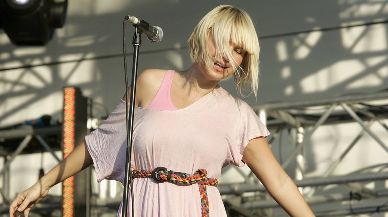 Sia performing on stage