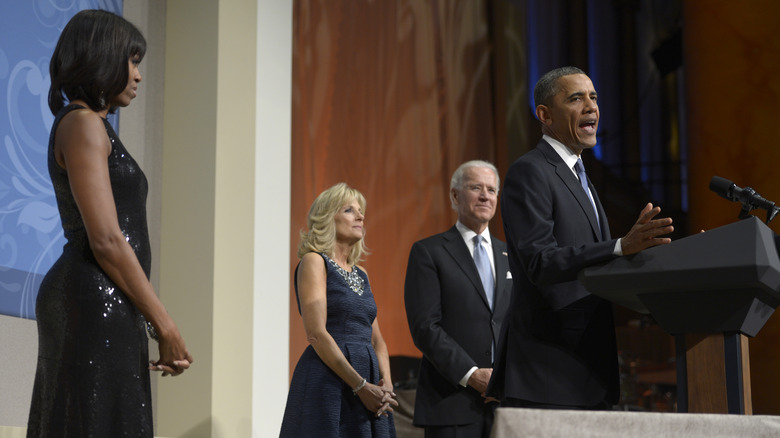 The Obamas and Bidens on stage