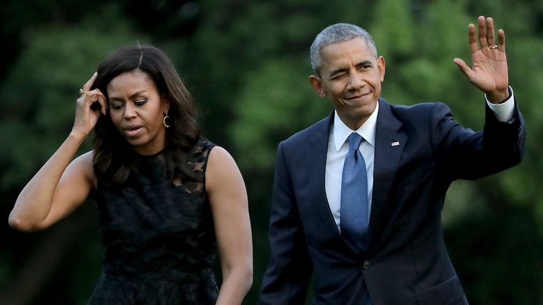 Barack and Michelle Obama walking together