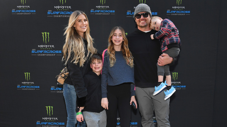 Christina Haack and Josh Hall pose with family