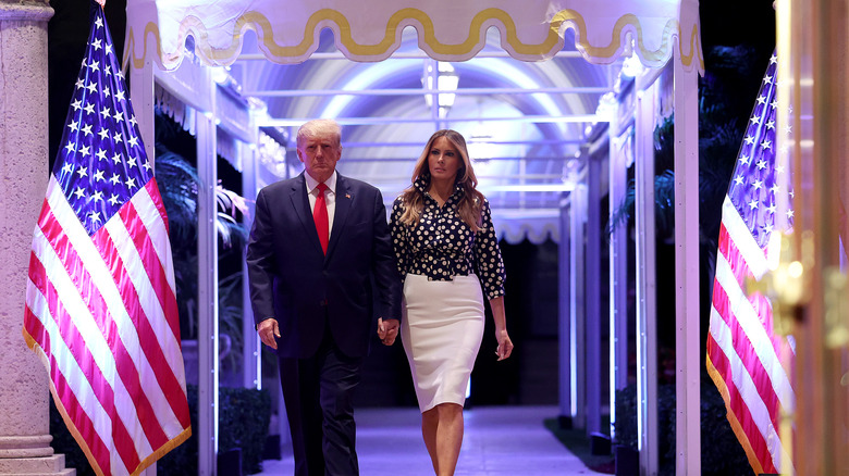 Melania and Donald Trump walking together