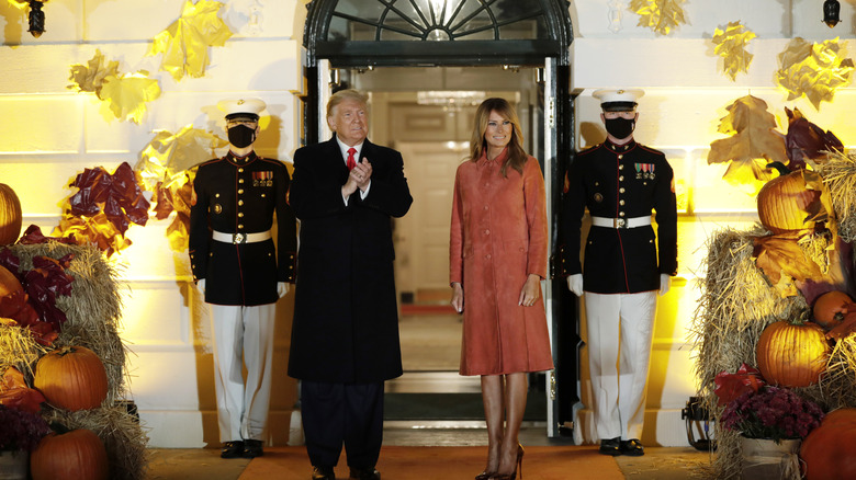 Donald and Melania Trump in front of the White House