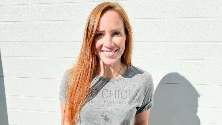 Mina Starsiak Hawk poses in a brand t-shirt 