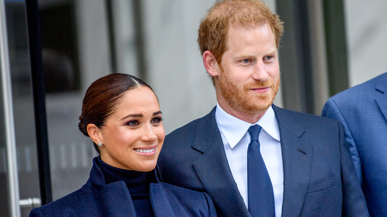 Prince Harry and Meghan Markle smiling