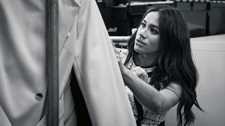 Meghan Markle sorting through clothes