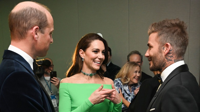 Prince William and Kate Middleton talking to David Beckham