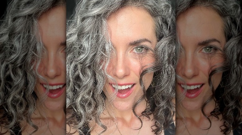 Woman with curly gray hair 