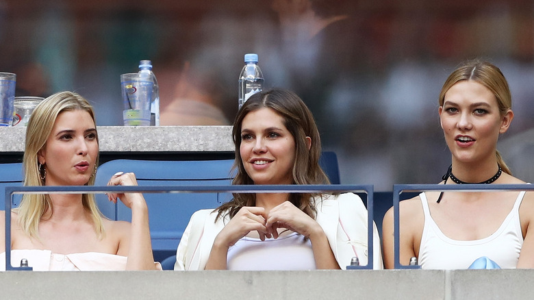 Ivanka Trump, Dasha Zhukova, and Karlie Kloss sitting together