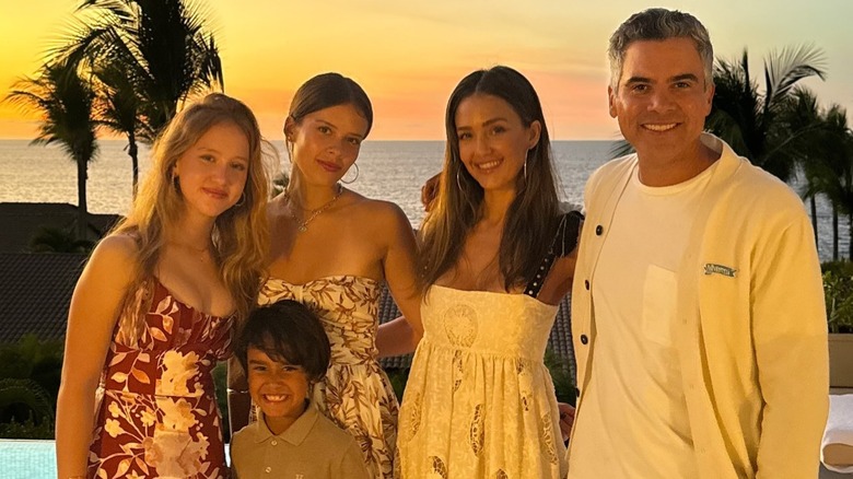 Jessica Alba and Cash Warren posing with their children