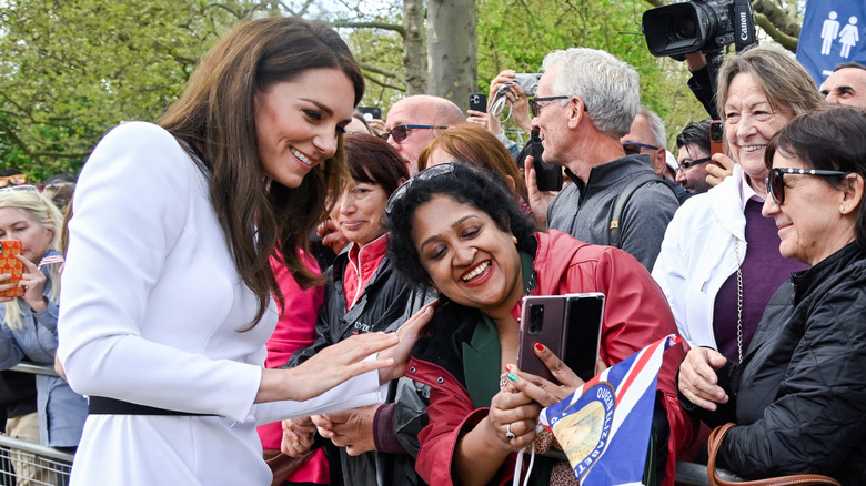 Kate Middleton greeting a crowd