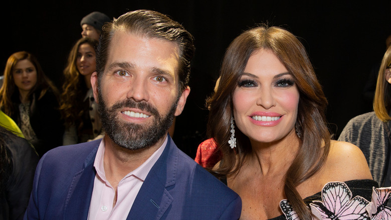 Kimberly Guilfoyle and Donald Trump Jr. smiling