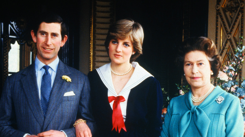 King Charles III, Princess Diana, and Queen Elizabeth II pose 
