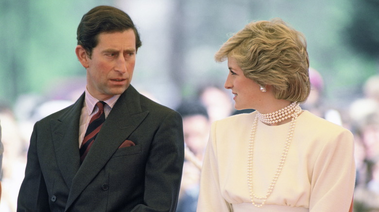 King Charles III looking at Princess Diana