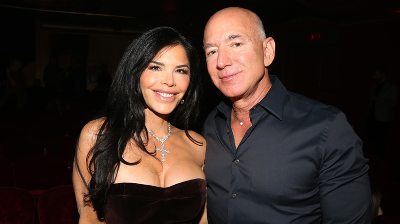 Jeff Bezos and Lauren Sánchez smiling for photos