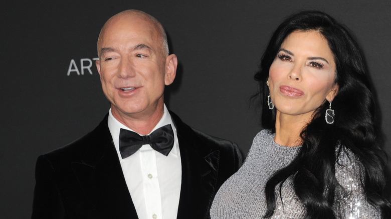 Lauren Sánchez and Jeff Bezos posing in their finery together