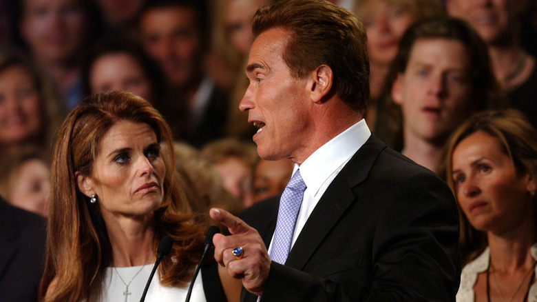 Maria Shriver looking at Arnold Schwarzenegger