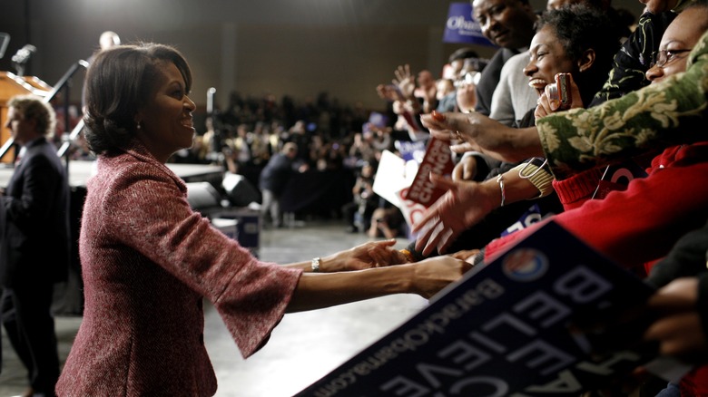 MIchelle Obama greets voters at victory rally