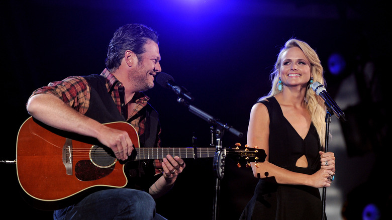 Blake Shelton and Miranda Lambert perform together on stage in Las Vegas at an event to support the troops