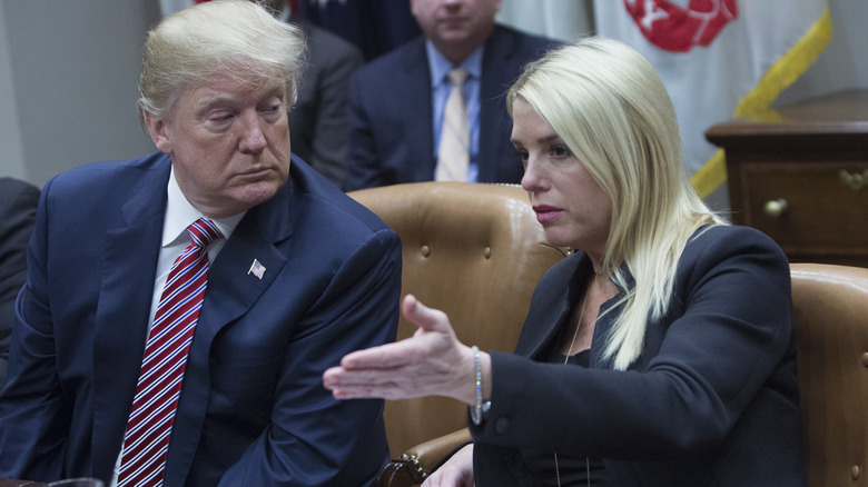 Pam Bondi speaking with Donald Trump