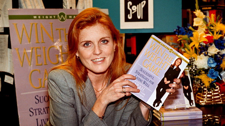 Sarah Ferguson holding her book