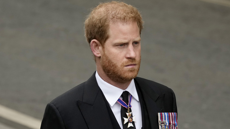 Prince Harry looking morbid